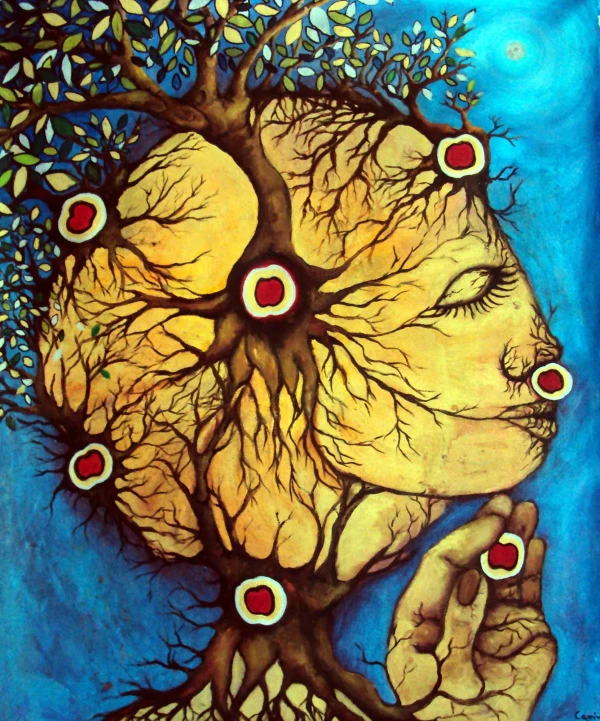 A hand holds a monkey’s heart seed. From it, the outline of a golden woman’s face emerges and grows around it. From the center of her face, a tree sprouts.