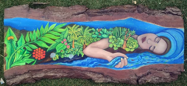 a woman lying like an island, holding the sea in her hand, her body is vegetal